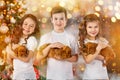 Happy children and dogs beside Christmas tree. New year 2018. Holiday concept, Christmas, New year background. Royalty Free Stock Photo