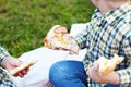 Happy children eating pizza outdoors Royalty Free Stock Photo