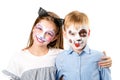 Happy children with face paintings on white background Royalty Free Stock Photo