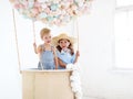 Happy children in a fairy magic hot air balloon Royalty Free Stock Photo