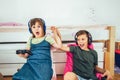 Children - girl and boy playing a video game Royalty Free Stock Photo