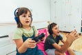 Children - girl and boy playing a video game Royalty Free Stock Photo