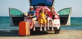 Happy children girls friends sisters on the car ride to summer trip Royalty Free Stock Photo