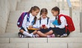 Happy children girlfriends schoolgirls student elementary schoo Royalty Free Stock Photo