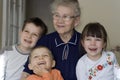Happy children with grandma Royalty Free Stock Photo