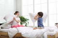 Happy children having pillow fight Royalty Free Stock Photo