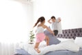 Happy children having pillow fight Royalty Free Stock Photo