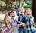 Happy children holding hands and giving friendship Royalty Free Stock Photo