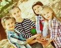 Happy children holding hands and giving friendship Royalty Free Stock Photo