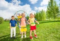 Happy children holding hula hoops during exercises Royalty Free Stock Photo