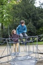 Happy children jumping on a trampoline or elastic bed Royalty Free Stock Photo