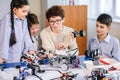 Happy children learn programming using laptops on extracurricular classes Royalty Free Stock Photo