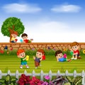 Happy children learn together with their friends in their garden Royalty Free Stock Photo