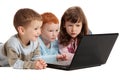 Happy children learning on kids notebook computer