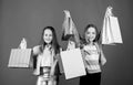 Happy children. Little girl sisters. Small girls with shopping bags. Sales and discounts. Sisterhood and family. savings Royalty Free Stock Photo