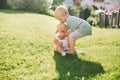 Happy children play on nature outdoors. Brother and sister. Royalty Free Stock Photo