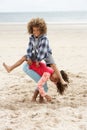 Happy children playing on beach Royalty Free Stock Photo