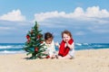 Happy children playing on the beach Royalty Free Stock Photo