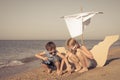 Happy children playing on the beach at the day time Royalty Free Stock Photo