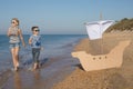 Happy children playing on the beach at the day time Royalty Free Stock Photo