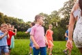 Happy children playing outdoors games in a park Royalty Free Stock Photo