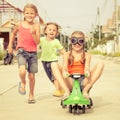 Happy children playing on the road Royalty Free Stock Photo