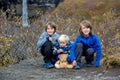 Happy children, posing in front of beautiful waterfall Svartifoss in Skaftafell national park i Royalty Free Stock Photo