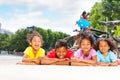 Happy children resting after cycling outdoors Royalty Free Stock Photo