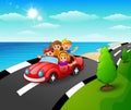 Happy children riding a car in the seaside road