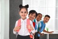 Happy children in school uniform with backpacks Royalty Free Stock Photo