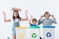 Happy children segregating household waste