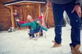 Happy children sledding at winter time Royalty Free Stock Photo