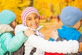 Happy children stand close with arms on shoulders Royalty Free Stock Photo