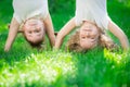 Happy children standing upside down Royalty Free Stock Photo