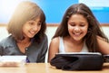 Happy children, students and eating food in classroom at school for meal, break or snack time. Young little girls or Royalty Free Stock Photo