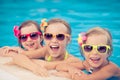 Happy children in the swimming pool Royalty Free Stock Photo