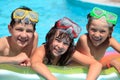 Happy children in swimming pool Royalty Free Stock Photo