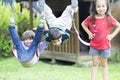 Happy children swinging Royalty Free Stock Photo