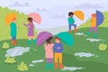 Happy children with umbrellas, coats and rubber boots walk under rain in city park Royalty Free Stock Photo