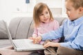 Happy children using laptop computer Royalty Free Stock Photo