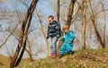 Happy children on the walk in sunny forest or park. Happy childhood