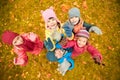 Happy children waving hands in autumn park Royalty Free Stock Photo