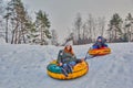 Happy children on a winter sleigh ride Royalty Free Stock Photo