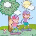 Happy childrens day, boy and girl riding skateboard in the park Royalty Free Stock Photo