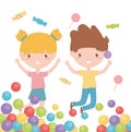 Happy childrens day, cheerful little boy and girl candies and colorful balls