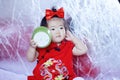 Happy Chinese little baby in red cheongsam have fun Royalty Free Stock Photo