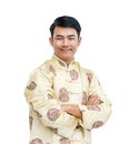 Happy Chinese man in traditional, isolated background with clipping path.