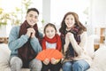 Happy chinese new year. asian family showing congratulation gesture at home Royalty Free Stock Photo