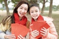 Happy chinese new year. asian family showing red envelope for lucky Royalty Free Stock Photo