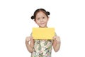 Happy Chinese New Year. Asian little girl wearing cheongsam smiling and holding gold envelope isolated on white background Royalty Free Stock Photo